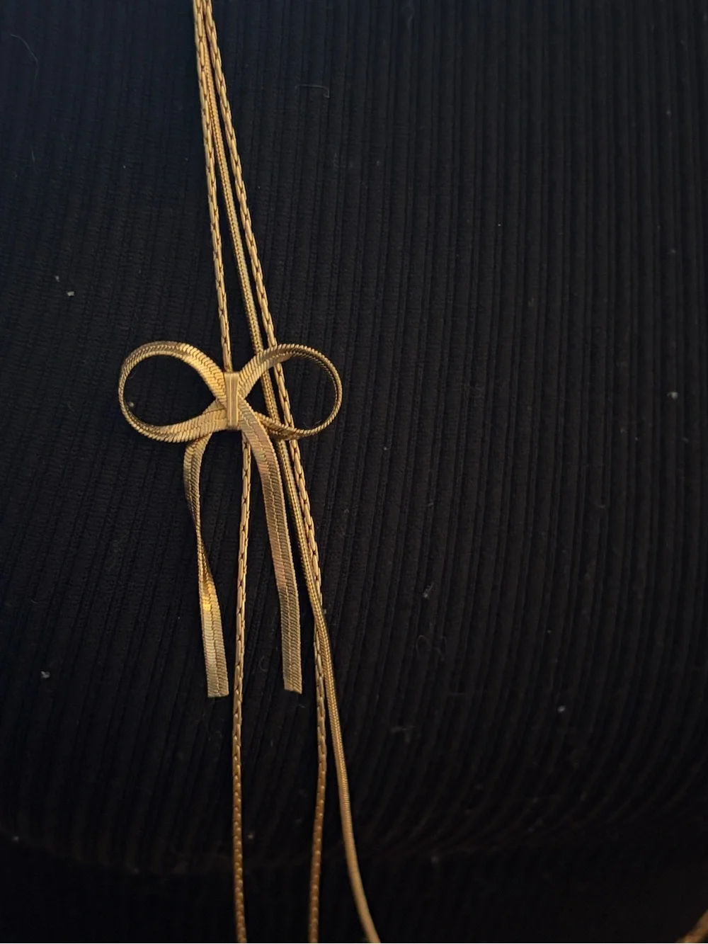 Candie's Long Multi-Strand Gold Tone Necklace with Bow Pendant
